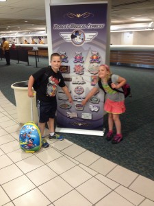 My twins getting ready to board the Magical Express