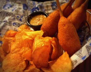  Lightsaber Bites – hand-dipped corn-battered knockwurst sausages with house-made chips and mustard dipping sauce (11.50)