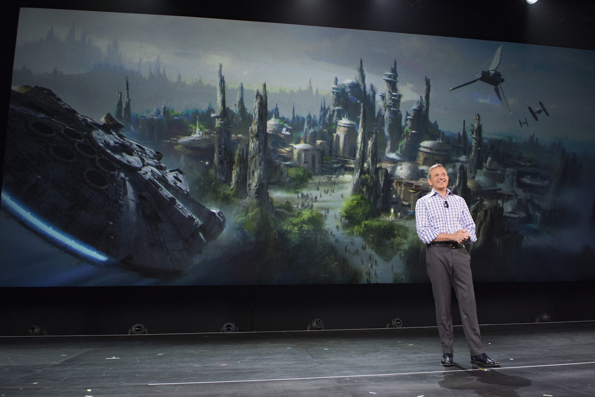 Walt Disney Company Chairman and CEO Bob Iger announced at D23 EXPO 2015 that Star Wars-themed lands will be coming to Disneyland park in Anaheim, Calif., and DisneyÕs Hollywood Studios in Orlando, Fla., creating DisneyÕs largest single-themed land expansions ever at 14-acres each, transporting guests to a never-before-seen planet, a remote trading port and one of the last stops before wild space where Star Wars characters and their stories come to life. These authentic lands will have two signature attractions, including the ability to take the controls of one of the most recognizable ships in the galaxy, the Millennium Falcon, on a customized secret mission, and an epic Star Wars adventure that puts guests in the middle of a climactic battle. (Richard Harbaugh/Disney Parks)
