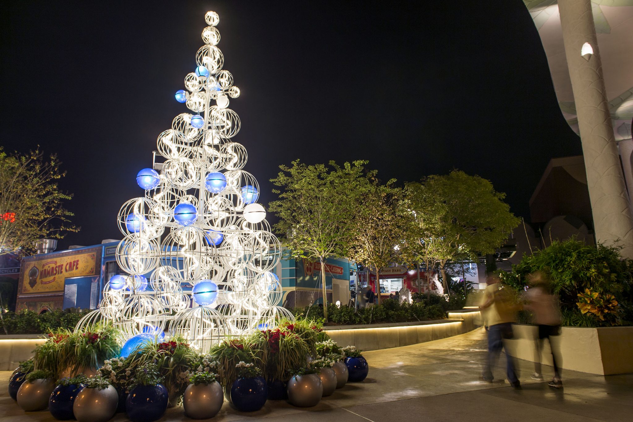 Guests will be transported to a magical winter wonderland as they visit the West Side neighborhood at Disney Springs with vibrant blue ornaments, beautiful white holiday lights, and contemporary Christmas trees. Each neighborhood in Disney Springs has been transformed into a unique holiday wonderland for the seasonÕs greetings, each reflecting the neighborhoodÕs role in the waterfront town. Disney Springs is the shopping, dining and entertainment venue at Walt Disney World Resort located in Lake Buena Vista, Florida.